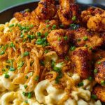Garlic Butter Chicken Bites & Cajun Alfredo Mac with Crispy Onion Topping 1