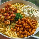 Creamy Cajun Chicken Pasta with Whipped Roasted Garlic Feta & Crispy Chickpeas