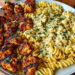 Delicious Tuscan Garlic Chicken Bites with Sun-Dried Tomato Cajun Alfredo Pasta Recipe