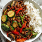 Spicy Ground Beef Stir-Fry Bowl with Garlic Veggies & Steamy Rice